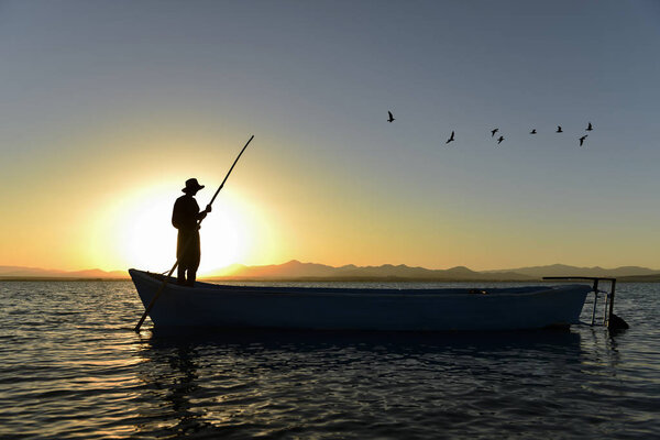 working hours for the fisherman, sunrise and a peaceful day