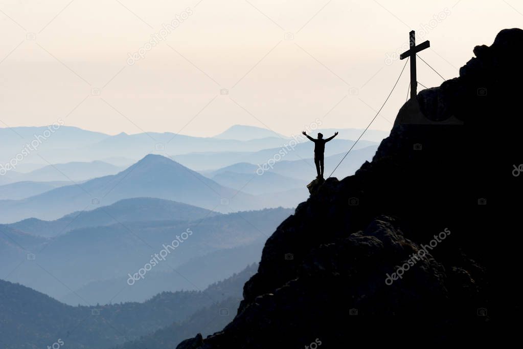 adventurer and climber reaching the target point