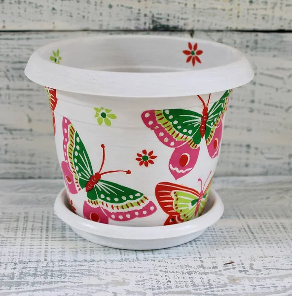 Beautiful decorative flowerpot handmade with decoupage style