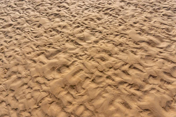 Draufsicht Bild Von Braunen Nassen Sandwelle Strand Strukturiert — Stockfoto