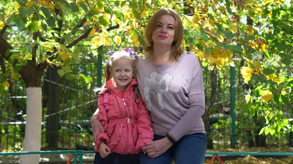 Potrait of preschool kid with teacher on a walk — Stock Photo, Image