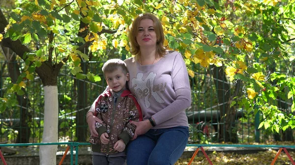 Potrait of preschool kid with teacher on a walk — Stock Photo, Image