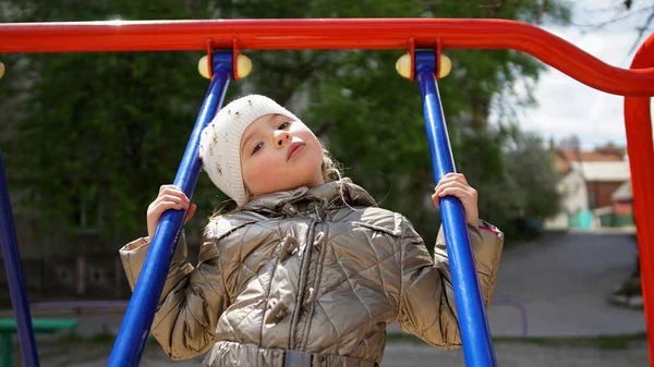 Little Cute Girl White Hat Riding Swing Blue Handrails Playground — Stock Photo, Image