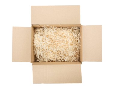Top view of open cardboard box with shredded wood excelsior for filling inside. Using natural sustainable material for wrapping or products background. Isolated on white, studio shot. clipart