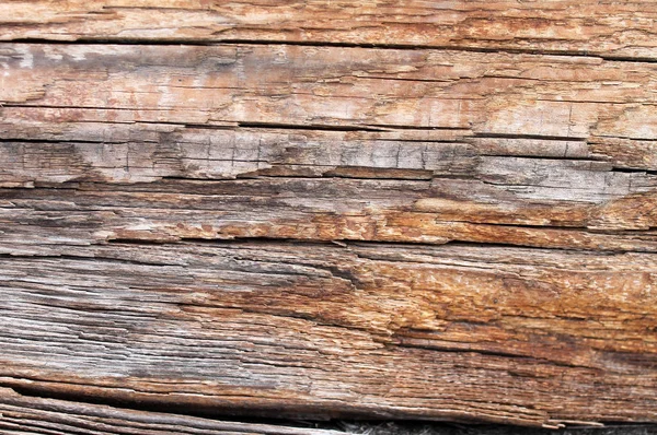 La vecchia struttura in legno con motivi naturali. Dentro lo sfondo dell'albero. Vecchio grungy e intemperie grigio parete di legno tavole texture sfondo — Foto Stock