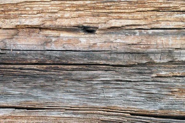De oude houtstructuur met natuurlijke patronen. In de achtergrond van de boom. Oude grungy en verweerd grijs houten muur planken textuur achtergrond — Stockfoto