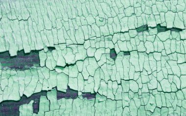 Kabuğu soyulmuş eski ahşap doku çatlak boyalı eski mavi tahta, eski ahşap arka plan, grunge kalas. Ahşap üzerinde eski boya kalıntıları olan eski ahşap bir arka plan. Eski bir ağacın dokusu, boyalı bir tahta, eski bir arkaplan.