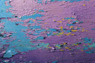 Ahşap üzerinde eski boya kalıntıları olan eski ahşap bir arka plan. Eski bir ağacın dokusu, boyalı bir tahta, eski model arka plan soyma boyası. Kırık boyalı eski mavi tahta, eski model