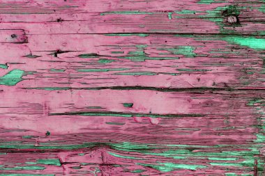 Ahşap üzerinde eski boya kalıntıları olan eski ahşap bir arka plan. Eski bir ağacın dokusu, boyalı bir tahta, eski model arka plan soyma boyası. Kırık boyalı eski mavi tahta, eski model