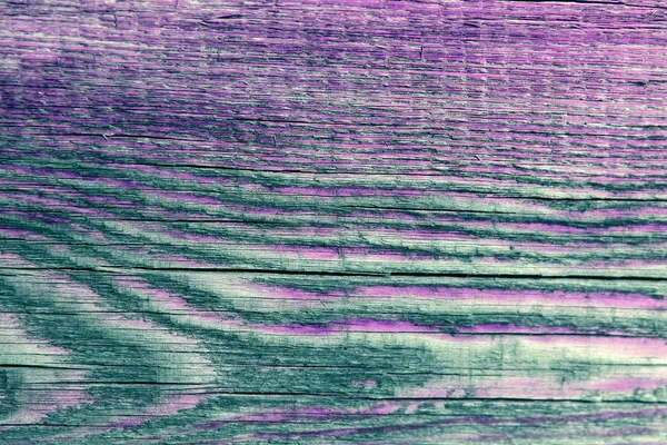 Fondo de pared de textura de tablón de madera con color de tono seleccionado. Fondo abstracto de una antigua pared de madera con una textura brillante. pintura ultravioleta — Foto de Stock