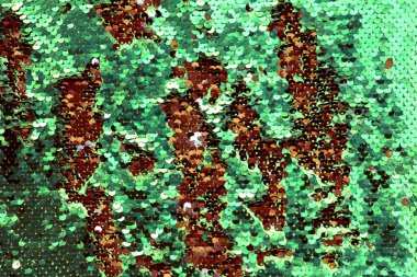 payetler payetler moda elbise, yuvarlak arka plan olarak renkli doku payetli. Metalik parlak pul pul arka plan