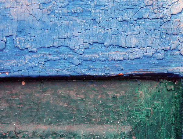 Eski ahşap arka plan ağaç eski boya artıkları parçaları kalıntıları ile. Doku eski ağaç bir kurulu ile boya, antika arka plan boya soyulmuştu. eski mavi kurulu ile kırık boya, vintage, woo