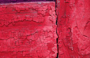 Ahşap üzerinde eski boya kalıntıları olan eski ahşap bir arka plan. Eski bir ağacın dokusu, eski bir ahşap arka plan soyma boyası. Kırık boyalı eski mavi tahta