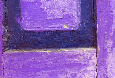 Ahşap üzerinde eski boya kalıntıları olan eski ahşap bir arka plan. Eski bir ağacın dokusu, eski bir ahşap arka plan soyma boyası. Kırık boyalı eski mavi tahta