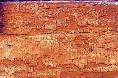 Ahşap üzerinde eski boya kalıntıları olan eski ahşap bir arka plan. Eski bir ağacın dokusu, eski bir ahşap arka plan soyma boyası. Kırık boyalı eski mavi tahta