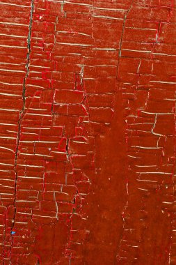 Ahşap üzerinde eski boya kalıntıları olan eski ahşap bir arka plan. Eski bir ağacın dokusu, eski bir ahşap arka plan soyma boyası. Kırık boyalı eski mavi tahta