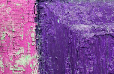 Ahşap üzerinde eski boya kalıntıları olan eski ahşap bir arka plan. Eski bir ağacın dokusu, eski bir ahşap arka plan soyma boyası. Kırık boyalı eski mavi tahta