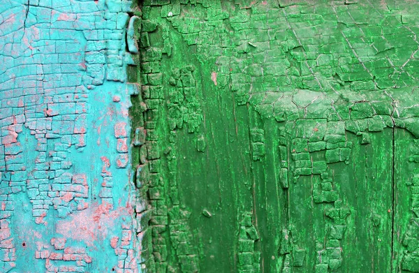 Παλιό ξύλινο φόντο με υπολείμματα από κομμάτια παλαιάς μπογιάς σε ξύλο. Υφή ενός παλιού δέντρου, vintage ξύλο φόντο ξεφλούδισμα χρώμα. παλιά μπλε πλακέτα με ραγισμένο χρώμα — Φωτογραφία Αρχείου