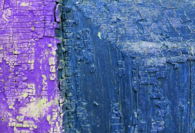 Ahşap üzerinde eski boya kalıntıları olan eski ahşap bir arka plan. Eski bir ağacın dokusu, eski bir ahşap arka plan soyma boyası. Kırık boyalı eski mavi tahta