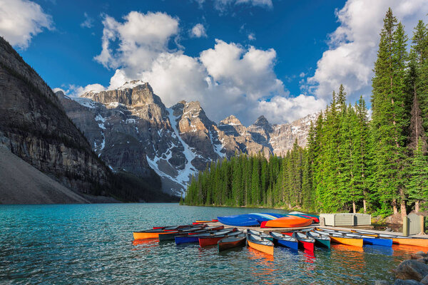 Canoes on Moraine lake, Banff national park in the Rocky Mountains, Alberta, Canada.