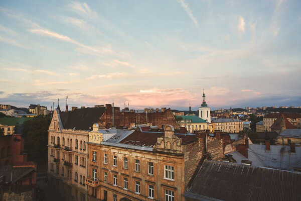 A view from rooftop on Lviv city skyline. view of the cityscape from the rooftop with wonderful cloudy sunset sky on background