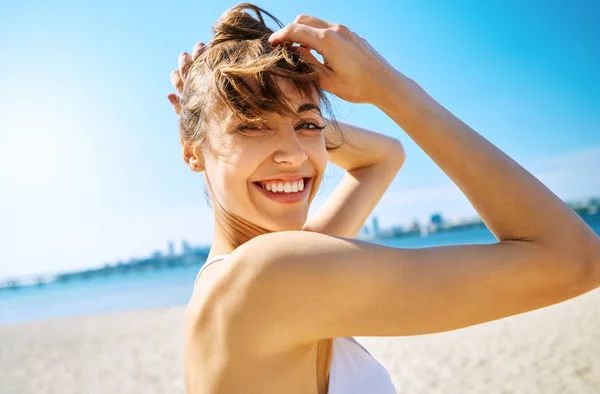 Close up portrait of beautiful sexy happy woman on the sand city beach with sea background. Summertime concept. — Stock Photo, Image