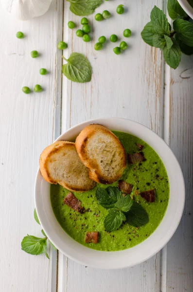 Pea soup, fresh herbs and bacon, food photography — Stock Image Pea Soup Fresh Herbs Bacon Food Photography Royalty Free Stock Photos