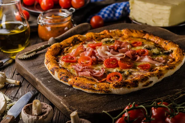 Rustic old style vintage pizza, wood board, fresh food