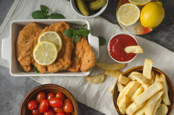 Homemade german schnitzel with pickles — Stock Photo, Image