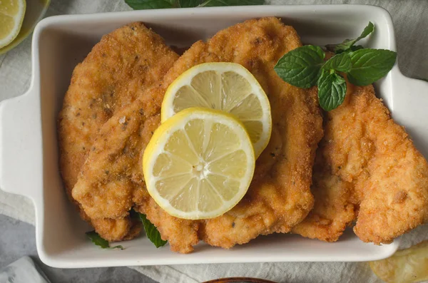 Homemade german schnitzel with pickles — Stock Photo, Image