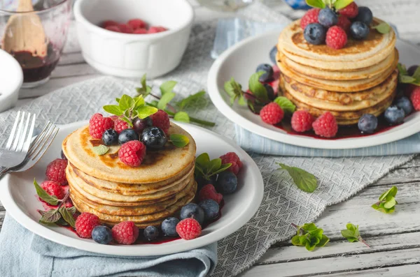 Pancakes with forest fruit sauce