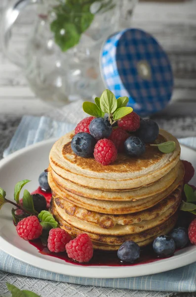 Pancakes with forest fruit sauce — Stock Photo, Image