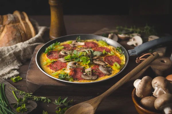 Homemade delish egg omelette with salami — Stock Photo, Image