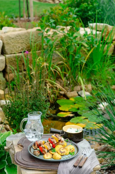 Outside grilling shish kebab — Stock Photo, Image