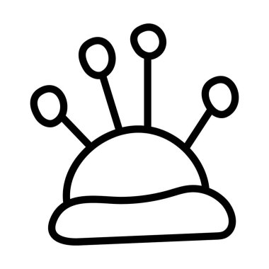 İğne desenli, küçük, doldurulmuş bir yastık.