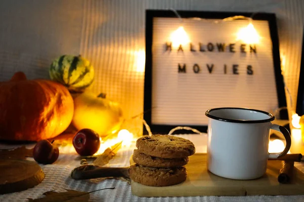Halloween decoration with letter board pumpkins and cookies