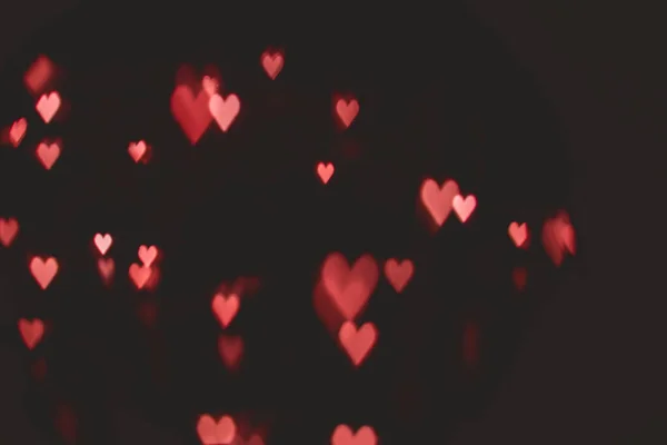 Ослабленный абстрактный красный цвет сердце форме bokeh огни фона. оранжевый День святого Валентина концепция. пространство для текста — стоковое фото