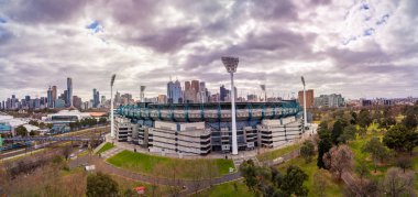 AUSTRALIA, MELBOURNE - AUGUST 09, 2018: Dark clouds looming over the Melbourne Cricket Ground clipart