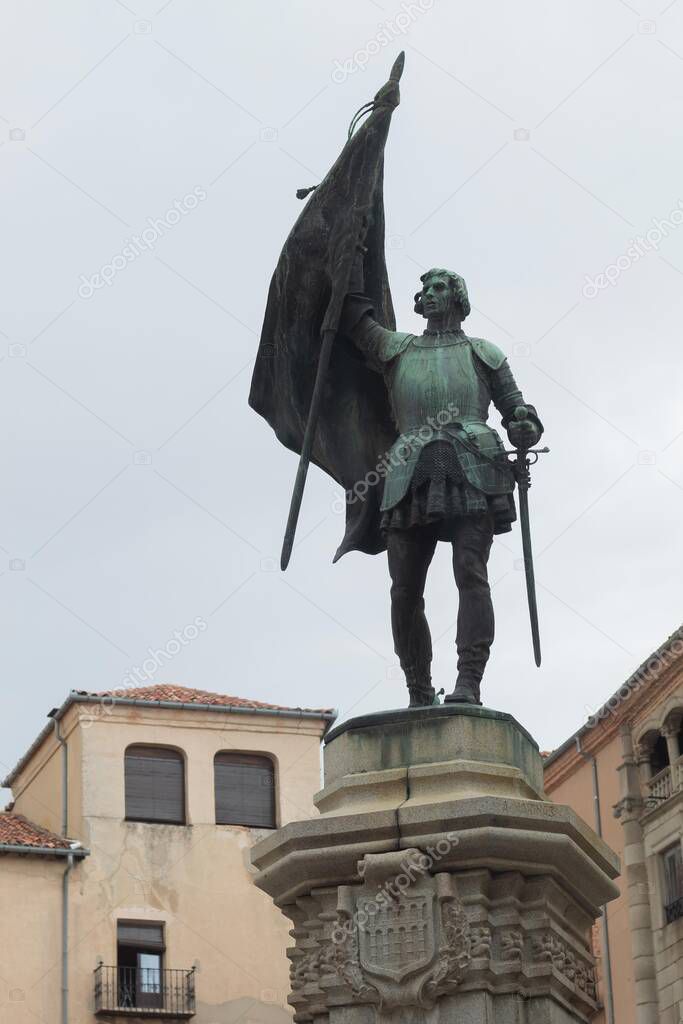 Statue of Juan Bravo in the plaza of Segovia in Spain on a summer day