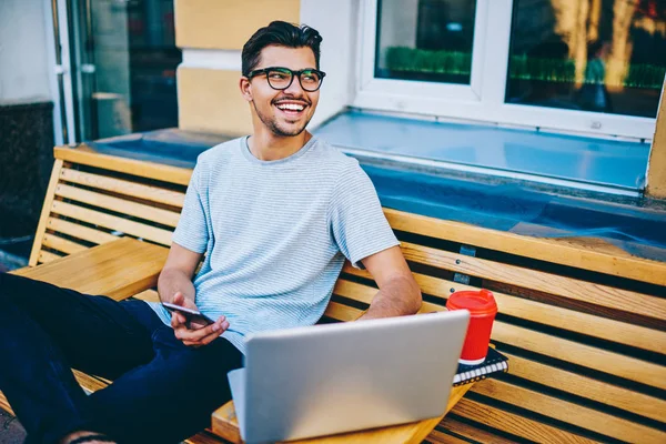 Happy Young Man Eye Glasses Laughing Looking Away While Synchronizing — Stock Photo, Image