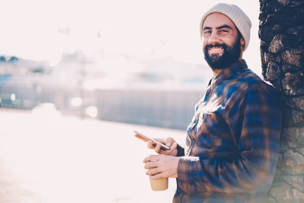 Portrait Positive Stylish Male Blogger Beard Smiling Camera While Holding — Stok Foto