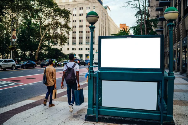 New York City Subway entrance with Clear empty billboard with copy space area for advertising text message or content, public metro transportation information board, promotional mock up on city street