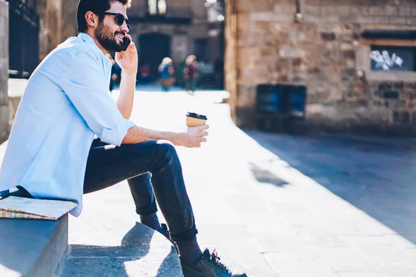 Bearded Young Man Talking Operator Mobile Benefits Smartphone Sitting Street — Stock Photo, Image