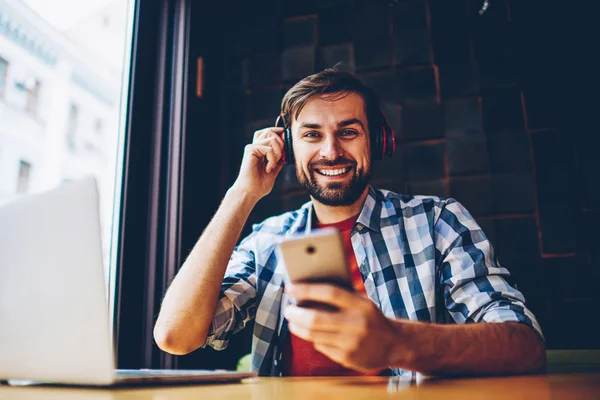 Portrait Happy Bearded Male Blogger Smiling Camera While Listening Songs — Stock Photo, Image