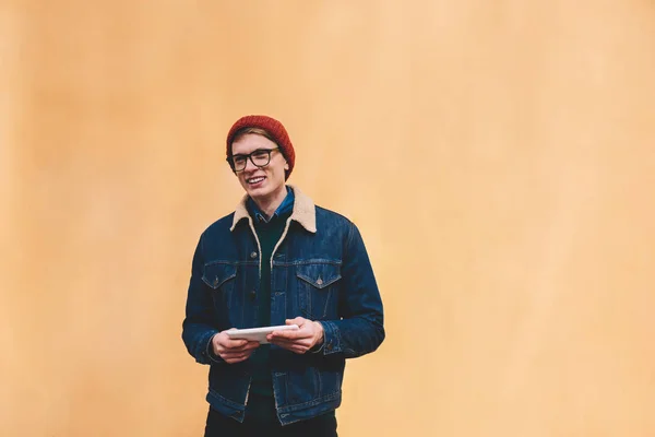 Cheerful Hipster Guy Modern Tablet Hands Smiling Away While Standing — Stock Photo, Image