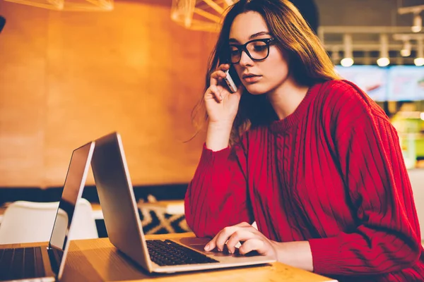 Serious Female Making Telephone Call Confirming Booking Web Page Making — Stock Photo, Image