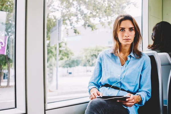 Pondering Female Passenger Earphones Listening Audio Book Downloaded Modern Touch — Stock Photo, Image