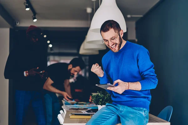 Overjoyed Caucasian Young Man Happy Victory Own Project While Reading — Stock Photo, Image