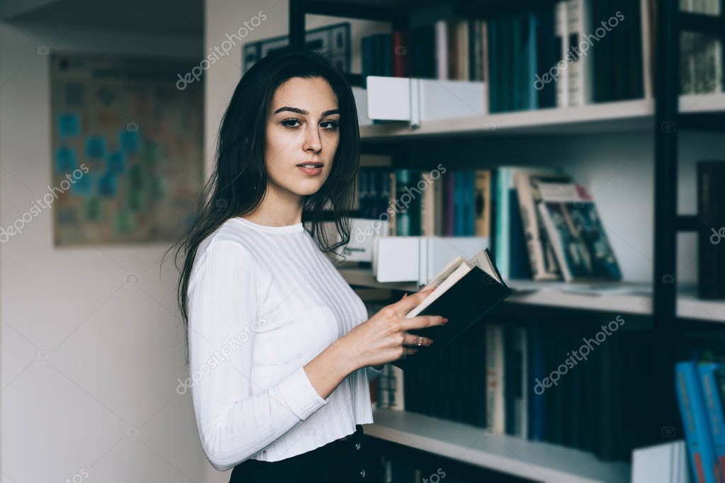 depositphotos_208658112-stock-photo-professional-female-librarian-looking-camera.jpg