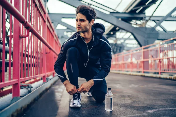 Runner Man Getting Ready Run Tying Sneakers Laces Bridge Listening — Stock Photo, Image